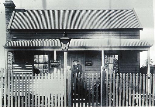 Dr. Embling standing outside house in Wodonga