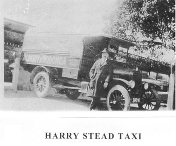 Harry Stead standing beside his taxi in Wodonga