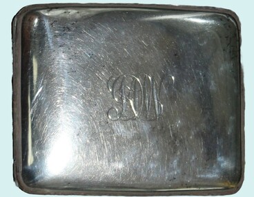 Silver cigarette case engraved with KDW