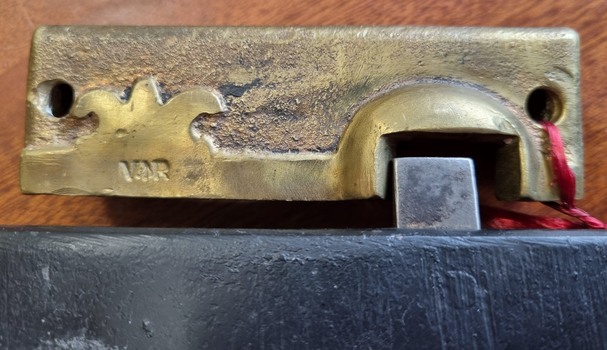 Striker plate from the door lock at 2 Ethel Lane, Wodonga
