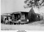 Outside a worker's home at MItta Junction