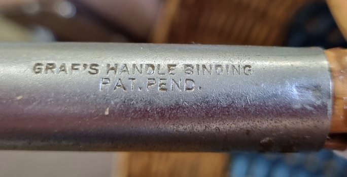 Metal Patent side on basket handle