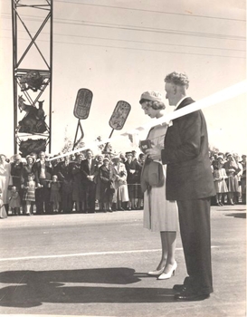 Princess Alexandra cutting the ribbon with Councillor J. S. Hore.