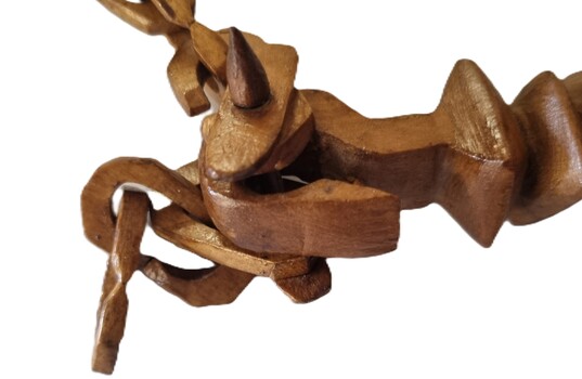 Whittled timber chain made from broomstick detail 4