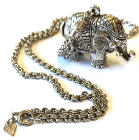 Silver Elephant on chain with tag attached