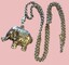 Silver Elephant on chain - side view