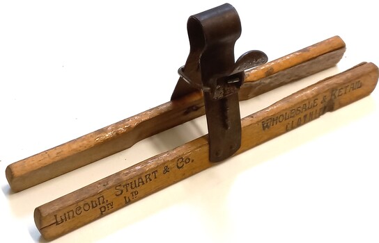 Lincoln Stuart & Co. Hanger - front view