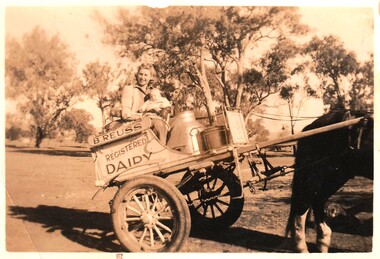 Joan Reuss on family delivery cart