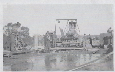 Pouring cement on bridge deck