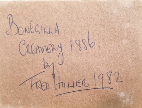 Inscription under base of clay model