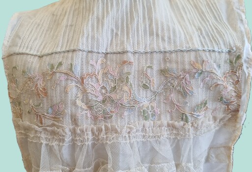 Lace work and embroidery on bodice