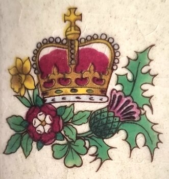 Decorative transfer on reverse of mug