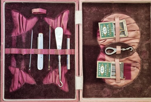 Open Sewing Kit with various implements