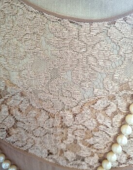 Lacework on dress bodice