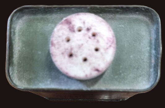 Foot Powder tin top with perforations