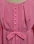 Detailed pintucking and buttons on bodice