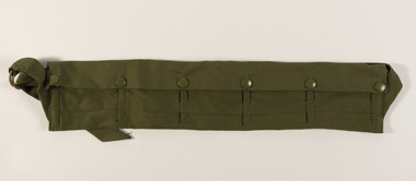 This Bandolier was used by the Australian Forces during the Vietnam War.  the green colouring matched the colour of combat clothing issued to Australian Defence Force personnel at that time. The item is in pristine as new condition.s