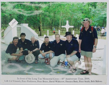 Photo in front of Long Tan Memorial cross, Photo