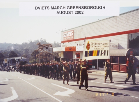 Shows march of DViets through Greensborough, Vietnam Veterans Day, August 2002
