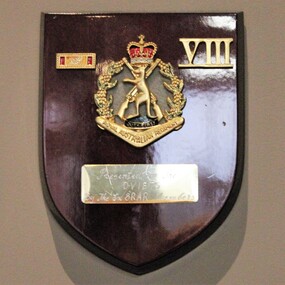 Wooden plaque presented to sub branch by 8RAR members.