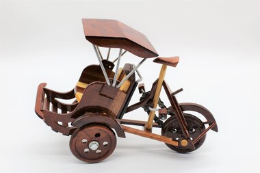 Handcrafted model of rickshaw.