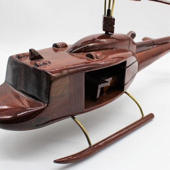 Polished wood model of Huey Helicopter.
