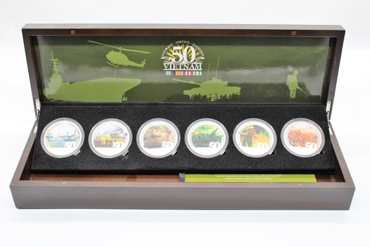 Commemorative collection of medallions in case depicting elements of Australian Armed Forces, Vietnam.