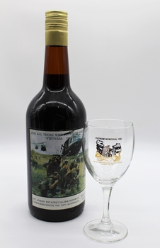 This bottle and glass is a presentation to Victorian Sub Branches with the iconic picture of soldiers awaiting a liftoff by helicopter.