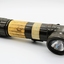 Army issued battery powered torch; olive drab in colour with beacon at right-angle to trunk.