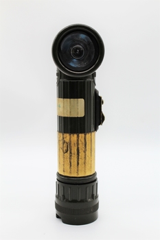 Army issued battery powered torch; olive drab in colour with beacon at right-angle to trunk.
