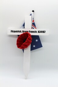 White Commemorative Cross, with red poppy and miniture Australian flag.