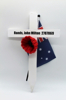 White Commemorative Cross, with red poppy and miniture Australian flag.