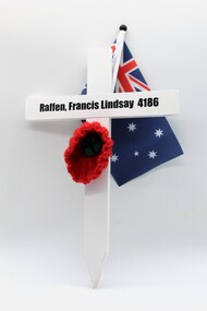 White Commemorative Cross, with red poppy and miniture Australian flag.