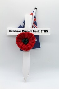 White Commemorative Cross, with red poppy and miniture Australian flag.