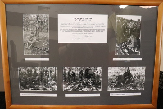 Collage with text and photographs of the Battle of long Tan.