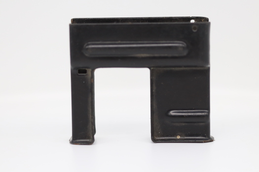 A black metal rectangular magazine loader.