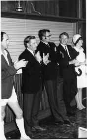 Black and white photograph, Opening of Power House Rowing Club with four men and one woman standing at the bar, 14 February 1970