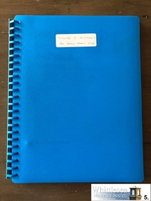 blue binder containing family history of the Mason family