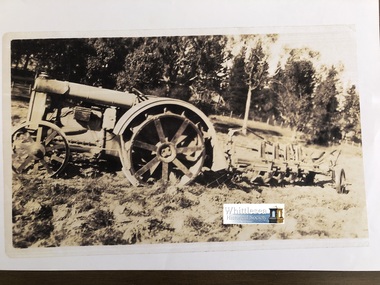 Photocopy of photograph, Ford tractor and plough Gibson's River Street Whittlesea, unknown