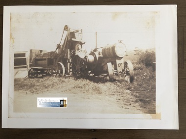 Photocopy of photograph, Alex and Ken McPhee's Buncle chaff cutter and 1914 International Titian tractor, unknown