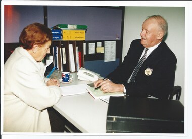 Photograph, Legatee giving advice