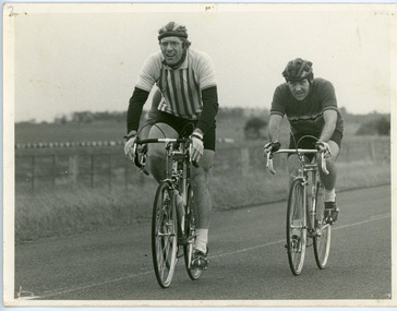 Photograph - Black and White Photograph, Two Cyclists on the road, 1960s