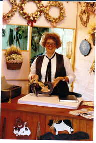 Photograph - Shop assistant inside shop No. 100 Maling Road, Jan Pigot, 27/03/1993 12:00:00 AM