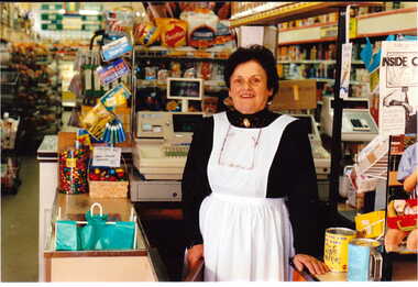 Photograph - Mrs. June Buckley standing at the counter of Buckley's Supermarket at No. 92 Maling Road, Jan Pigot, 27/03/1993 12:00:00 AM
