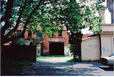 Photograph - Wattle Valley Street view of the red brick stables behind the Canterbury Mansions, Jan Pigot, 1994