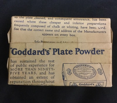 Packet of Goddard's plate powder. Non-mercurial plate powder. In white packaging with blue writing.