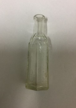Clear Glass Bottle.  ' and Sons Manufacturers of Lemos', embossed on bottle.