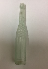 Opaque long neck bottle with etched, twisted pattern.