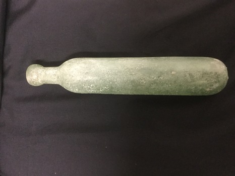 Green, Round Bottomed Glass bottle.