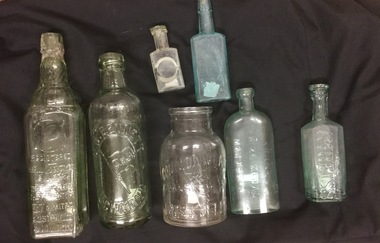 Glass bottles, G.H. Bennett, Bottle no. 6) Between 1884 - 1916